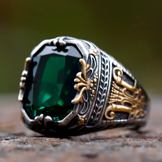 Crown ring with green stone, silver tone