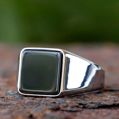 Faceted black stone ring, silver tone