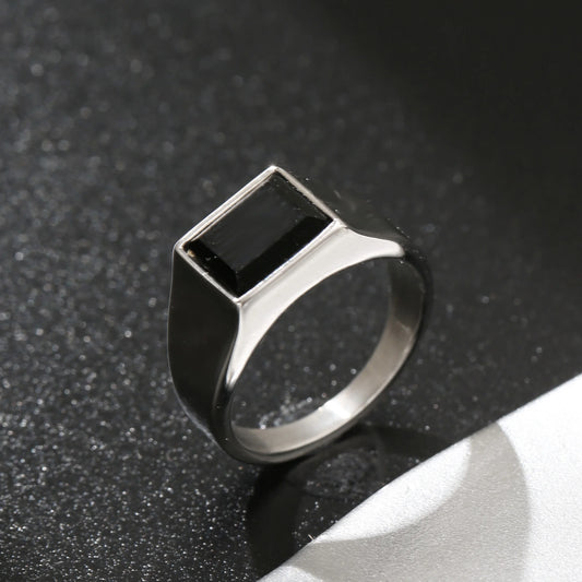 Square signet ring with black stone, silver tone